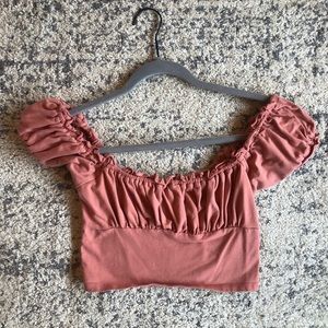 Pink off the shoulder ruffled crop top